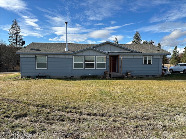 single story home with a front lawn