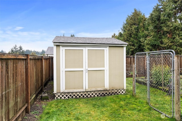 view of outdoor structure with a lawn