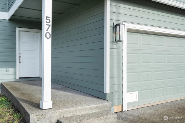 entrance to property with a garage