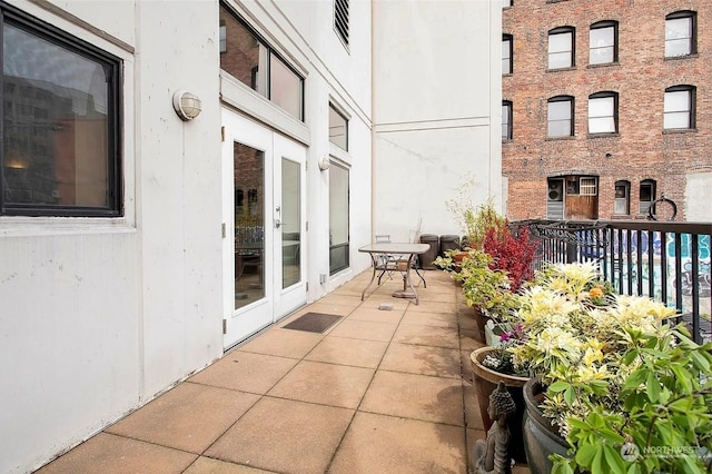 balcony featuring french doors