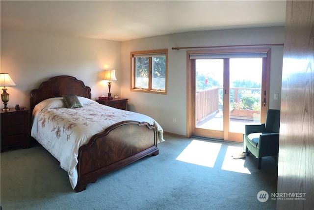 bedroom featuring access to outside and carpet