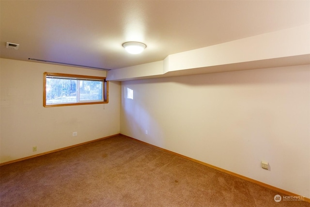 basement with carpet flooring