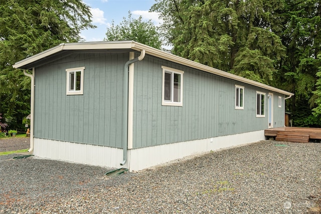 view of home's exterior featuring a deck