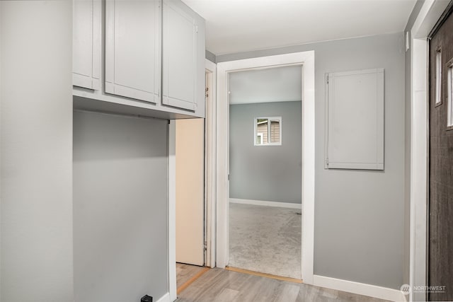 hallway featuring light wood-type flooring