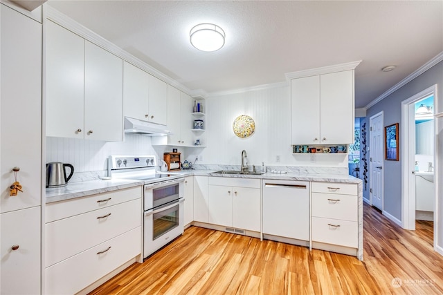 kitchen featuring dishwasher, white range with electric cooktop, crown molding, sink, and white cabinetry