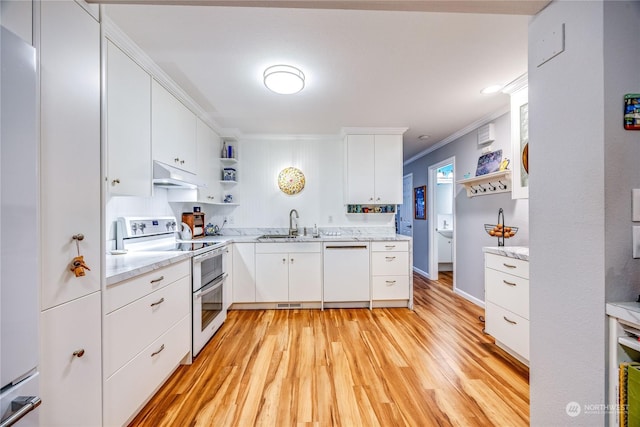 kitchen with white cabinetry, sink, light hardwood / wood-style flooring, crown molding, and white appliances