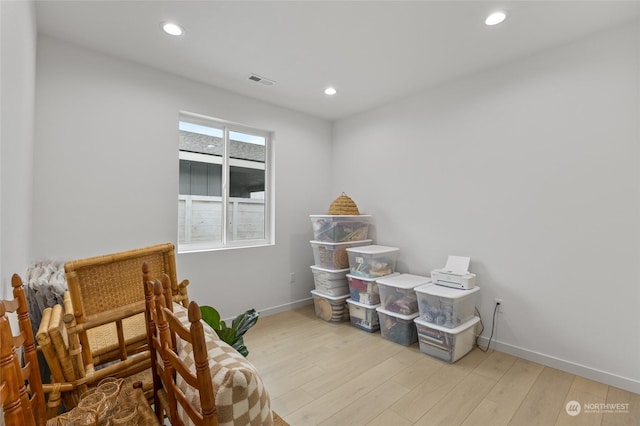 sitting room with light wood-type flooring