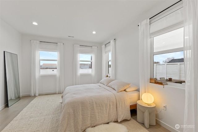 bedroom featuring light wood-type flooring