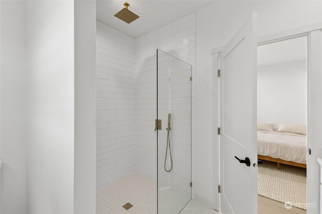 bathroom featuring tiled shower