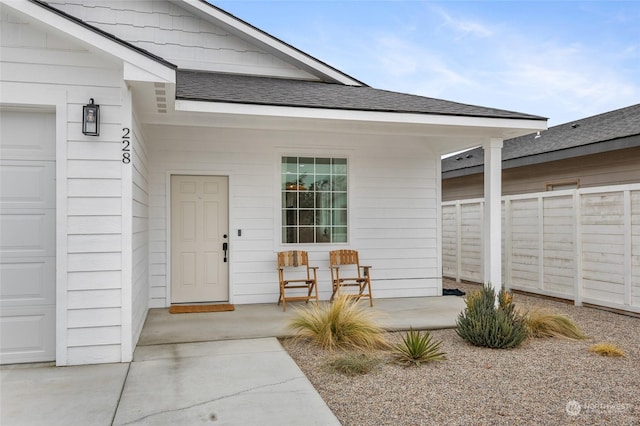 property entrance featuring a porch