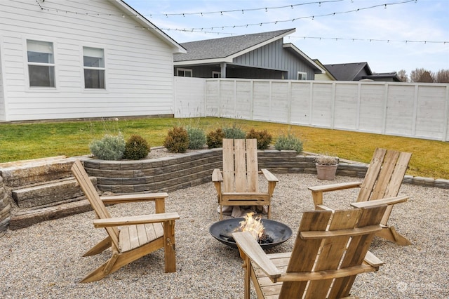 view of patio featuring an outdoor fire pit