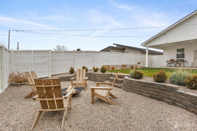 view of patio / terrace featuring a fire pit