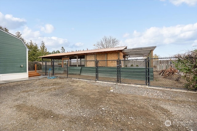 exterior space featuring an outbuilding