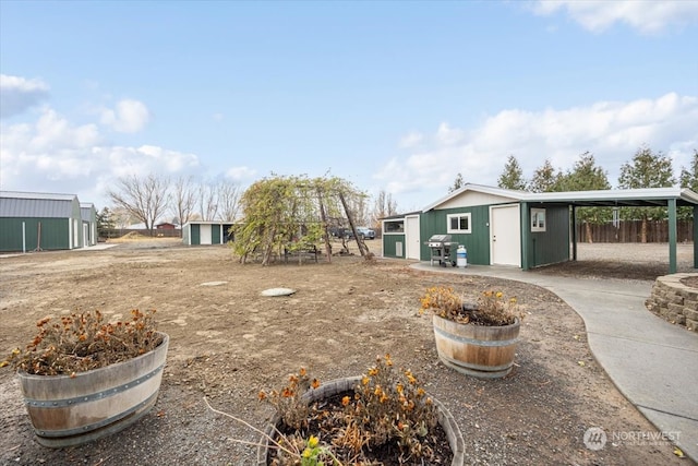 view of yard with a carport