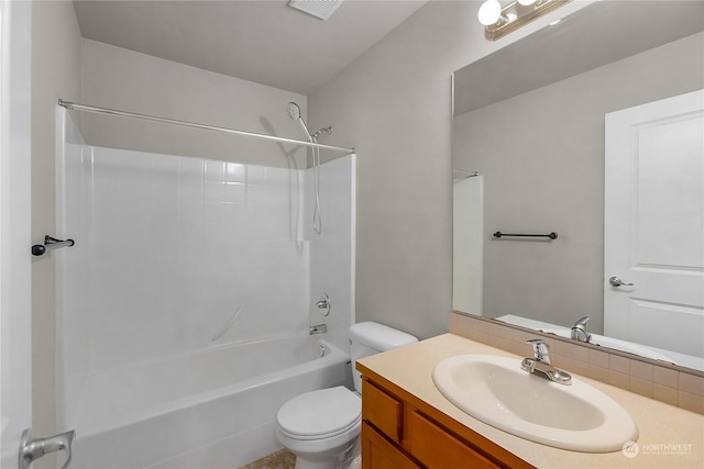 full bathroom with bathtub / shower combination, vanity, and toilet