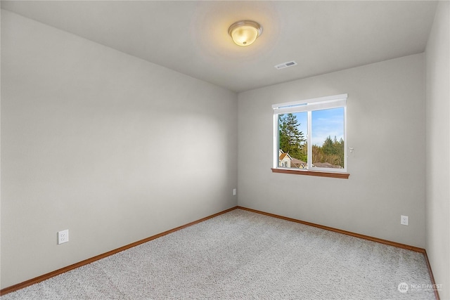 view of carpeted spare room