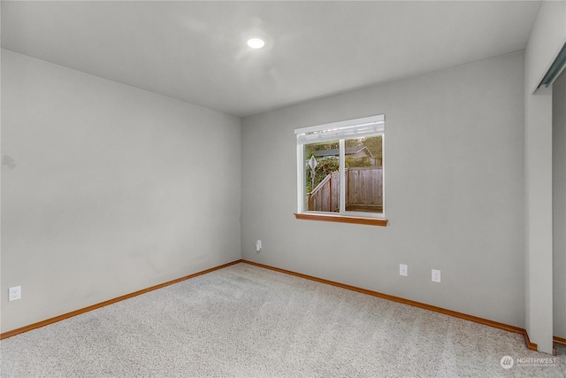 empty room with carpet floors