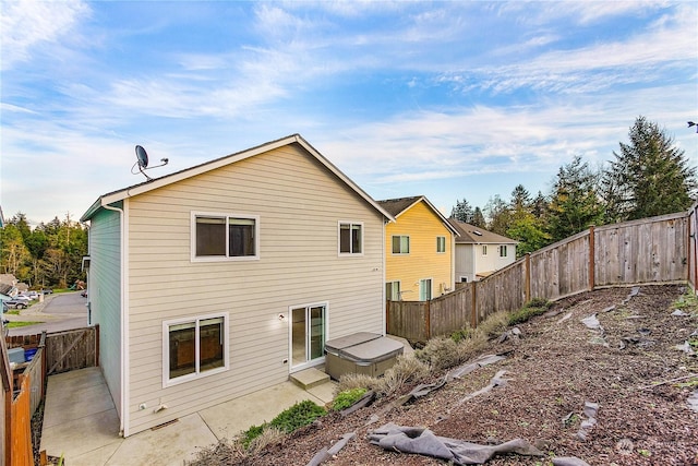 back of house featuring a patio area