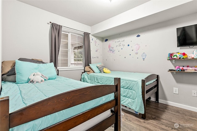 bedroom featuring hardwood / wood-style floors