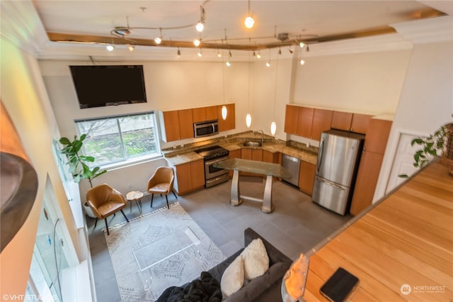 kitchen featuring crown molding, sink, light wood-type flooring, a towering ceiling, and stainless steel appliances