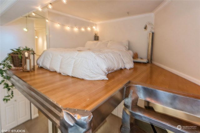 bedroom featuring ornamental molding