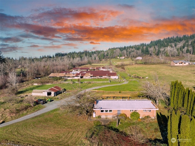 view of aerial view at dusk