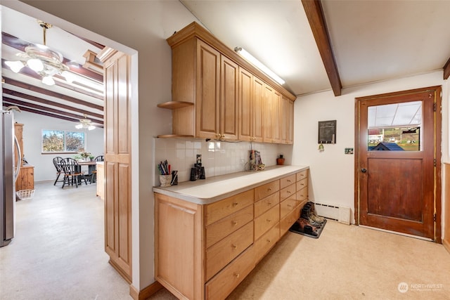 kitchen featuring beam ceiling, light colored carpet, backsplash, and stainless steel refrigerator