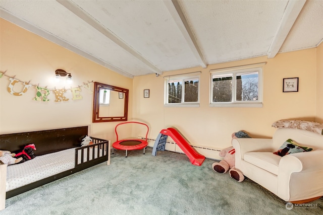 living area with beamed ceiling, carpet flooring, a healthy amount of sunlight, and a baseboard radiator