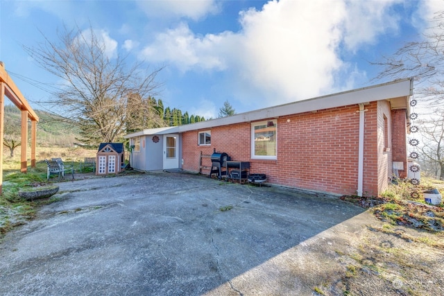 rear view of house with a patio area