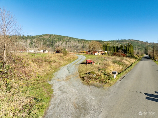 view of road featuring a rural view