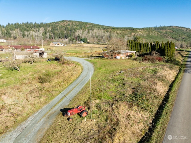 aerial view featuring a mountain view and a rural view