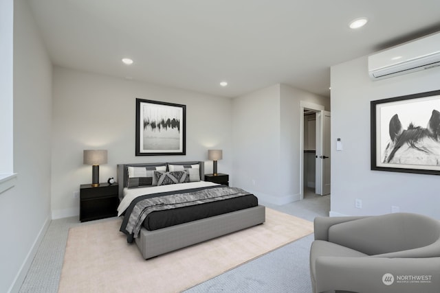 carpeted bedroom featuring a wall unit AC