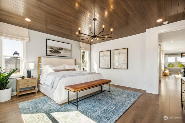 13734 SE 84th St Unit 14, Newcastle, WA 98059 - bedroom featuring wooden ceiling, a chandelier, wood finished floors, and recessed lighting