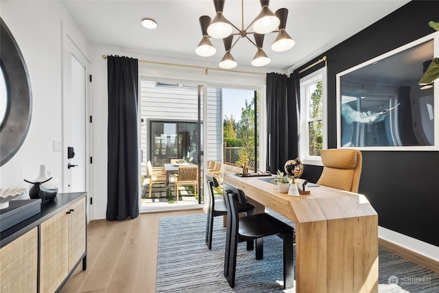 13734 SE 84th St Unit 14, Newcastle, WA 98059 - dining area featuring light wood-style floors, a chandelier, and a desk