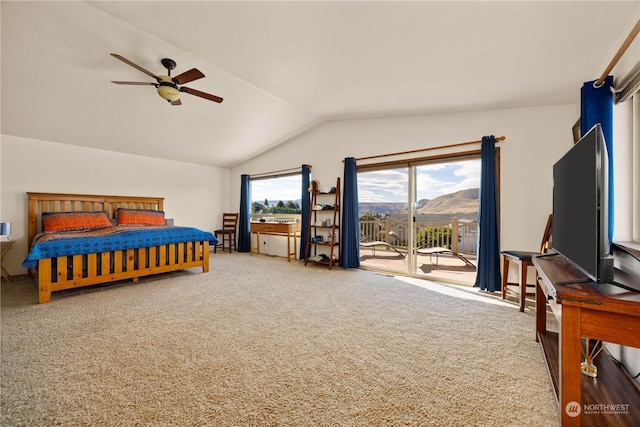 carpeted bedroom featuring access to exterior, ceiling fan, and vaulted ceiling