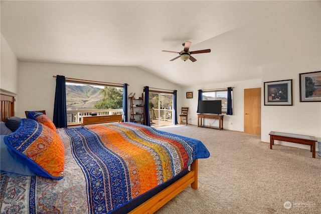 carpeted bedroom featuring ceiling fan, access to exterior, and lofted ceiling