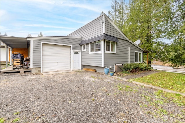 exterior space with a garage