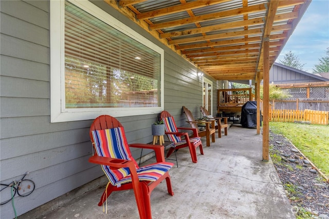 view of patio / terrace with fence