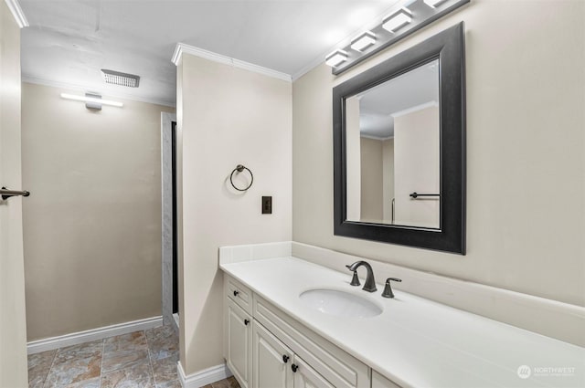 bathroom with vanity and crown molding