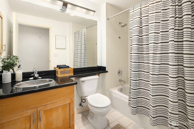 full bathroom featuring tile patterned floors, vanity, toilet, and shower / bath combo with shower curtain