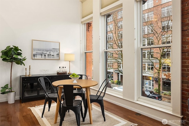 2324 1st Ave Unit 202, Seattle, WA 98121 - dining room with wood finished floors and baseboards