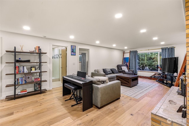 living room with light hardwood / wood-style floors