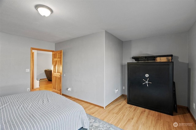 bedroom featuring hardwood / wood-style flooring