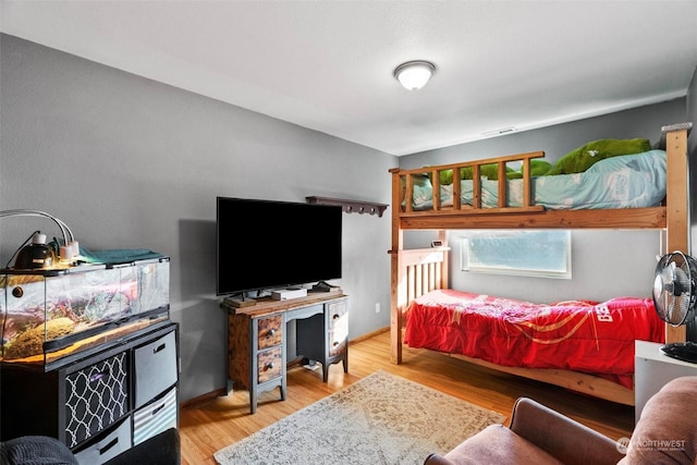 bedroom with light wood-type flooring