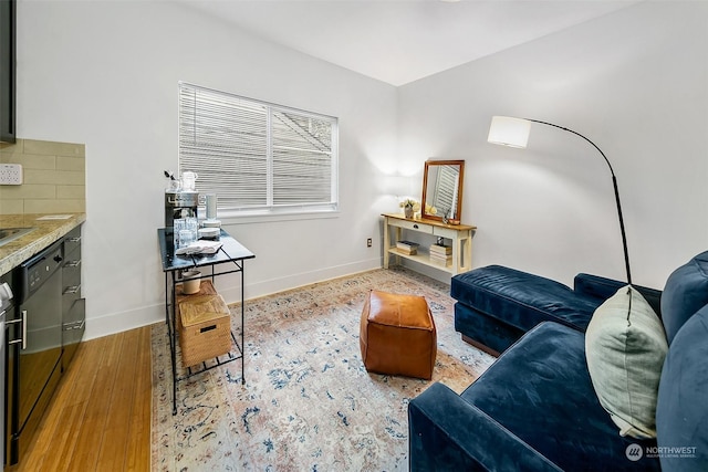 living room with light hardwood / wood-style floors