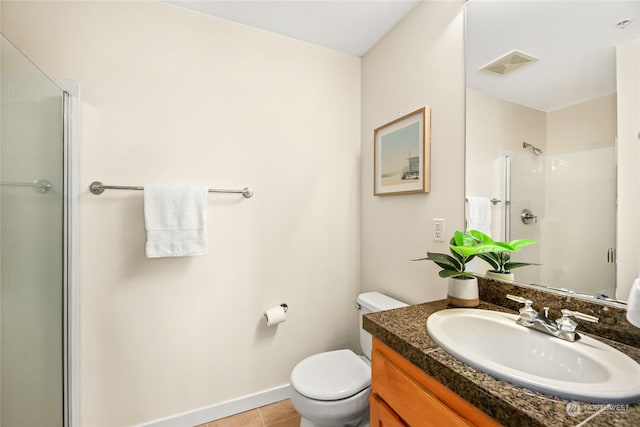 bathroom with tile patterned flooring, an enclosed shower, and toilet