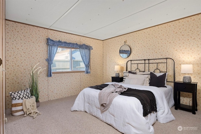 carpeted bedroom with ornamental molding