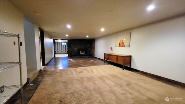 hallway featuring recessed lighting and baseboards