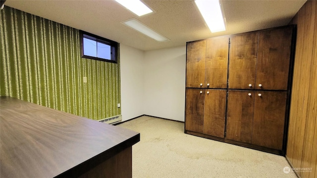 interior space with a textured ceiling