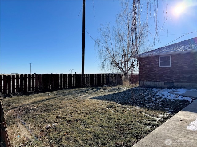 view of yard with fence